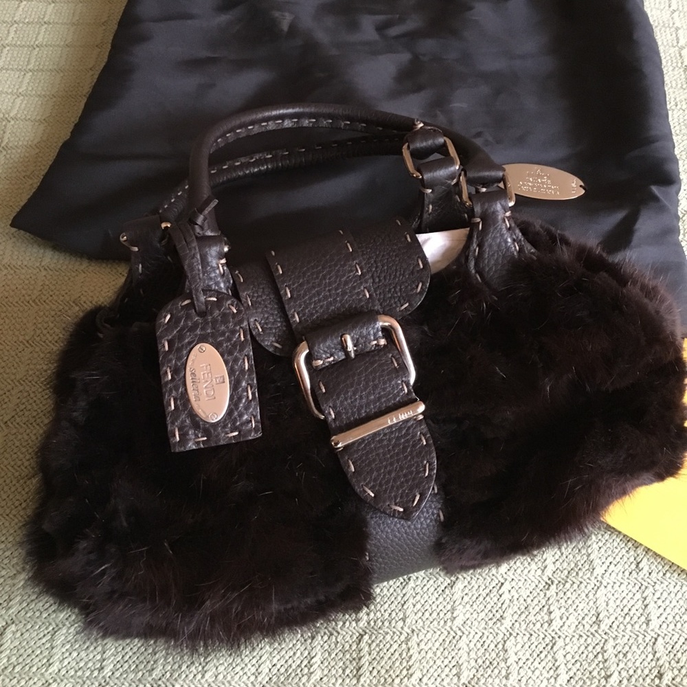 Never used mink Fendi purse.